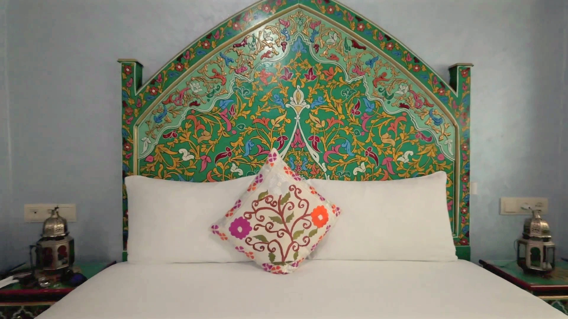 Moroccan Riad Architecture: Hand-Painted Cedar Headboard
